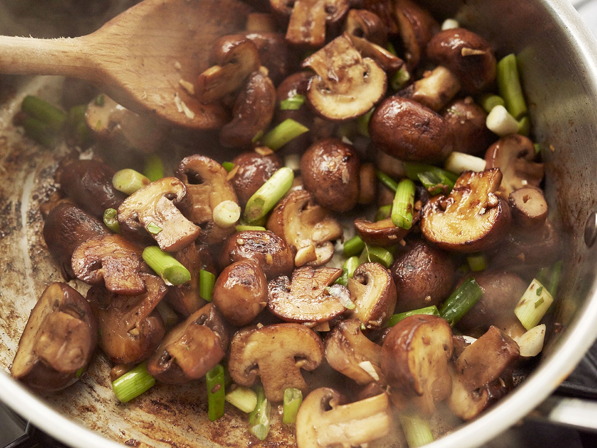 Proper, hot, hard frying gives great flavour to the most bogstandard corner-shop fungi (Joe Woodhouse)