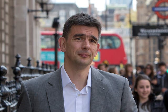 Google's Northern Europe boss Matt Brittin leaves a British parliamentary Public Accounts Committee inquiry into tax avoidance at Portcullis House in London