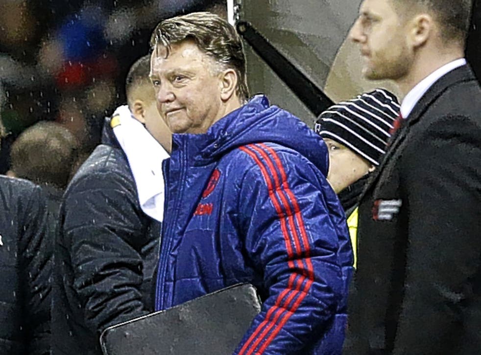 Louis van Gaal almost breaks into a smile after his Manchester United side’s victory at the iPro Stadium