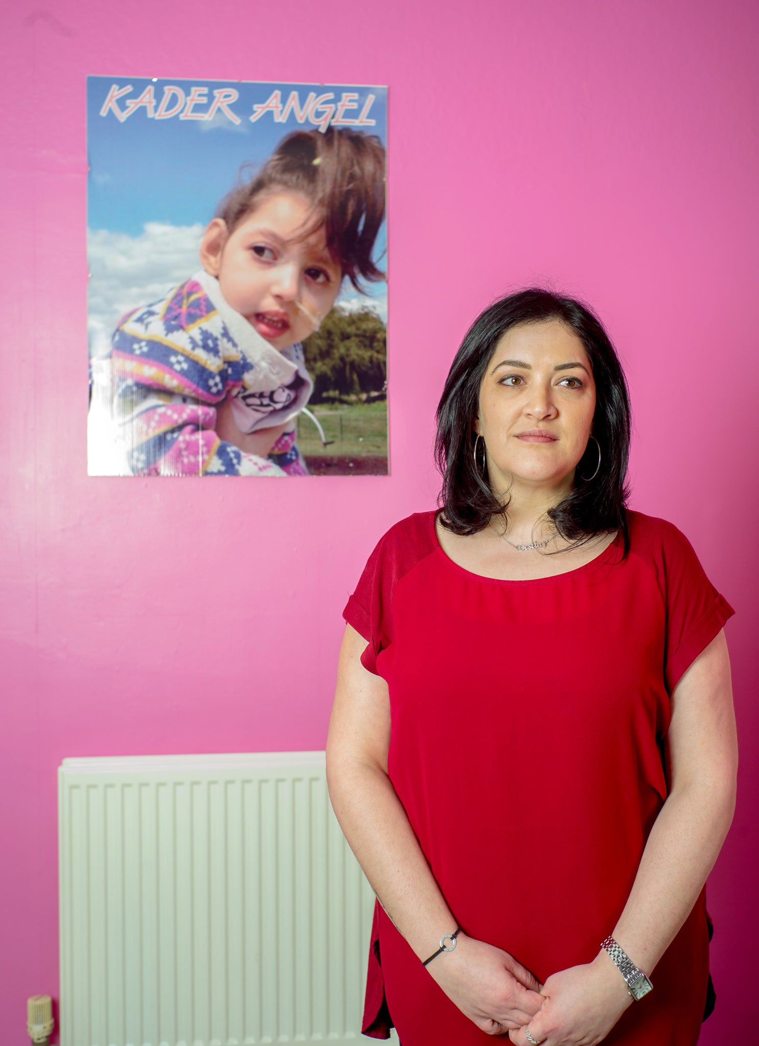 Sonay Mustafa with a picture of her late daughter in the room that would have been hers