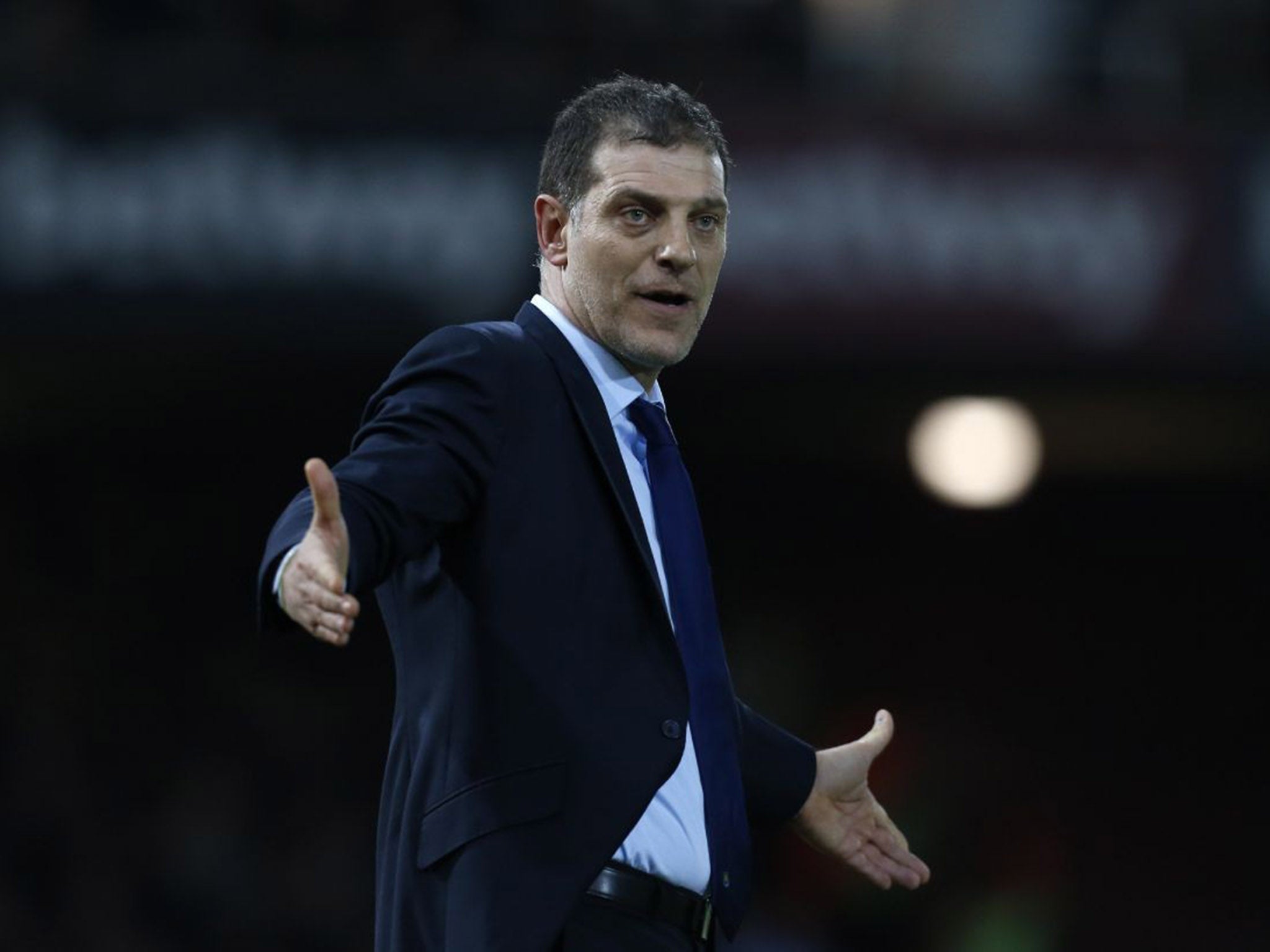West Ham United's Croatian manager Slaven Bilic reacts after West Ham concede a penalty during the English Premier League football match between West Ham United and Manchester City at The Boleyn Ground in Upton Park.