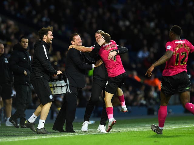 Jon Taylor rushes to the touchline