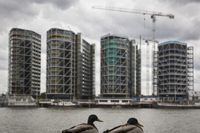 Luxury flats go up by the Thames. New figures show that property prices are booming, the average home in the capital is now worth £500,000 and the prices are being driven up