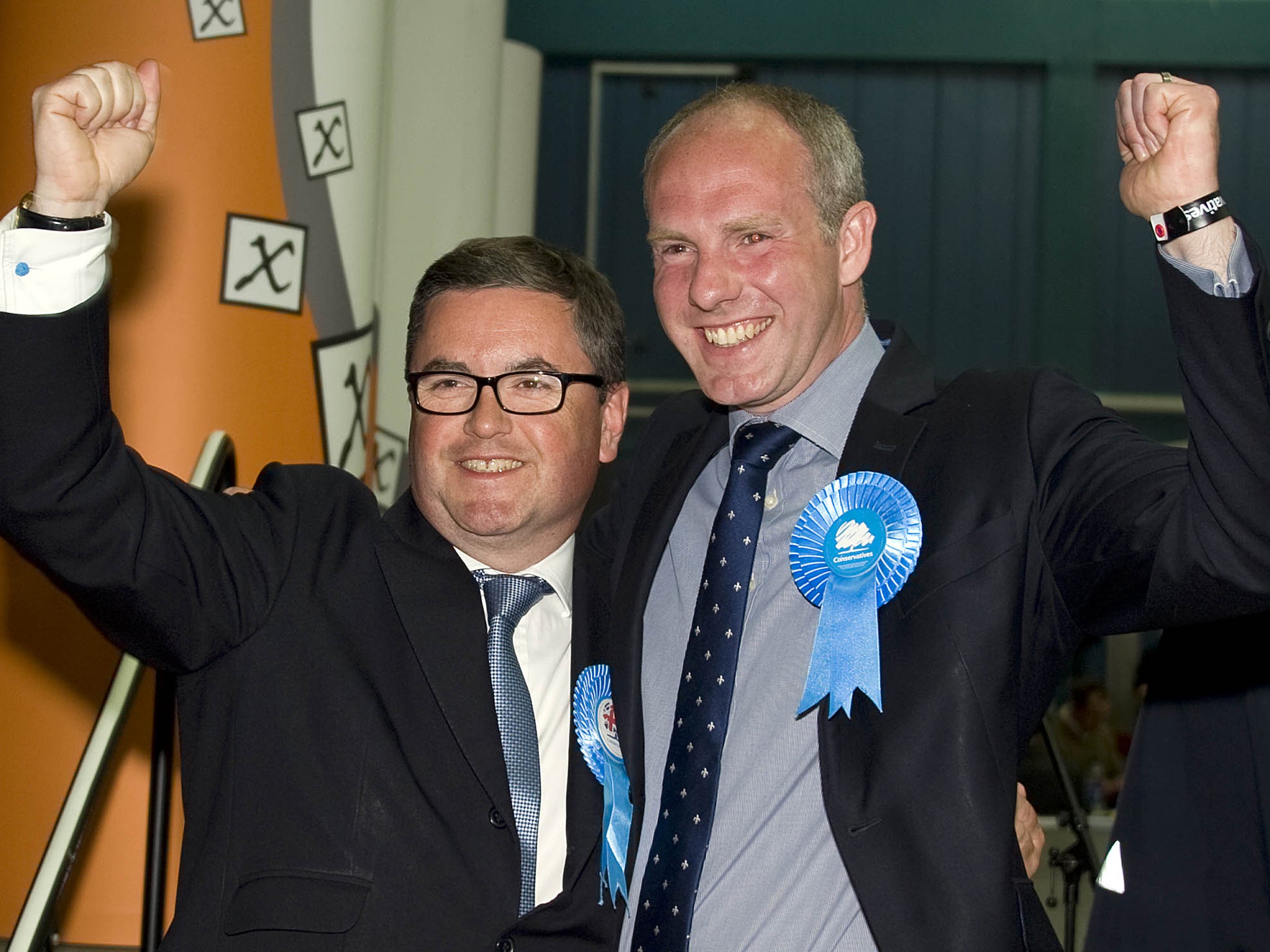 Robert Buckland, left, celebrates a double victory with Justin Tomlinson, Swindon's two Conservative MPs, in May last year