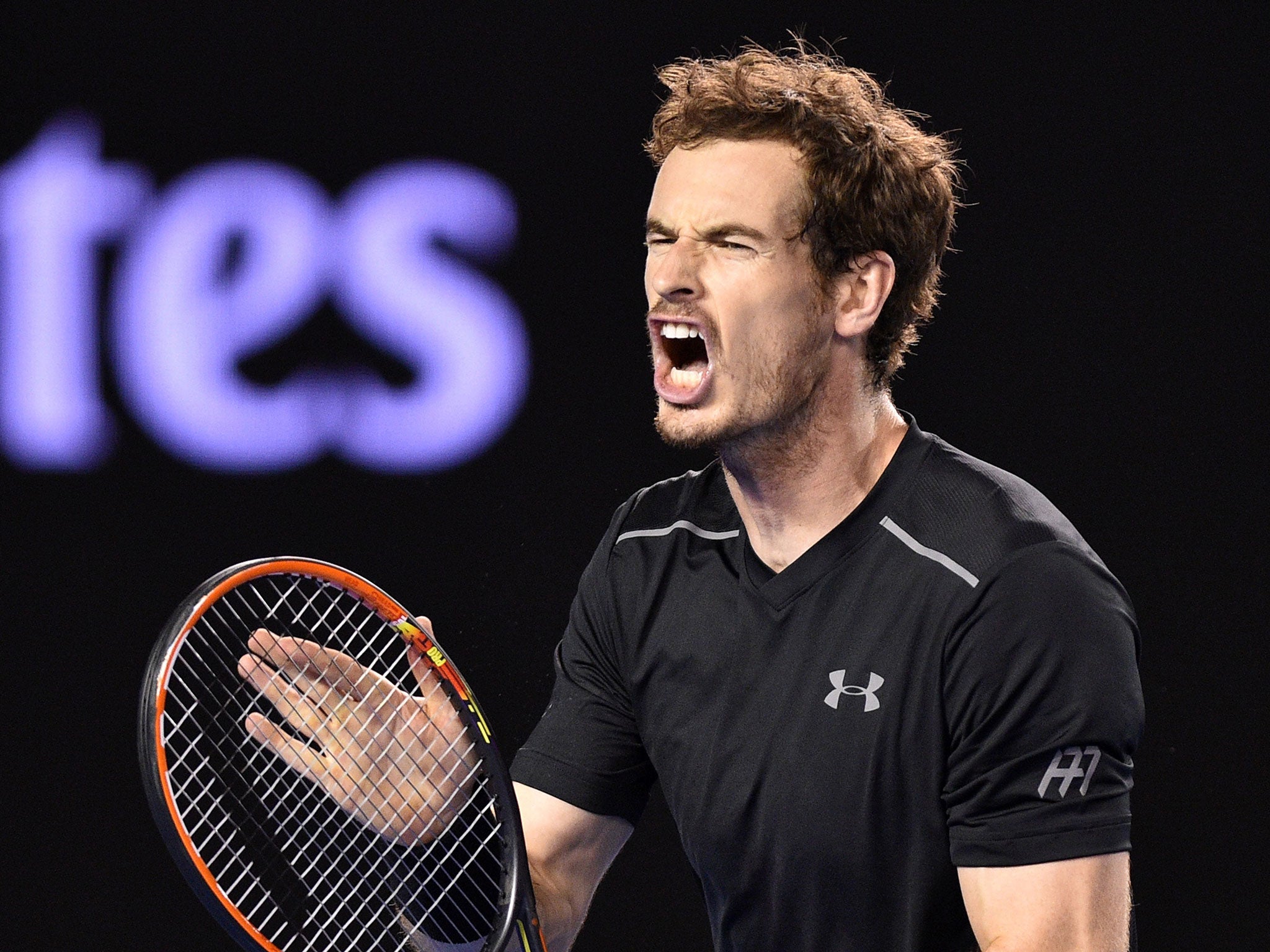 Andy Murray reacts after being broken in the second set