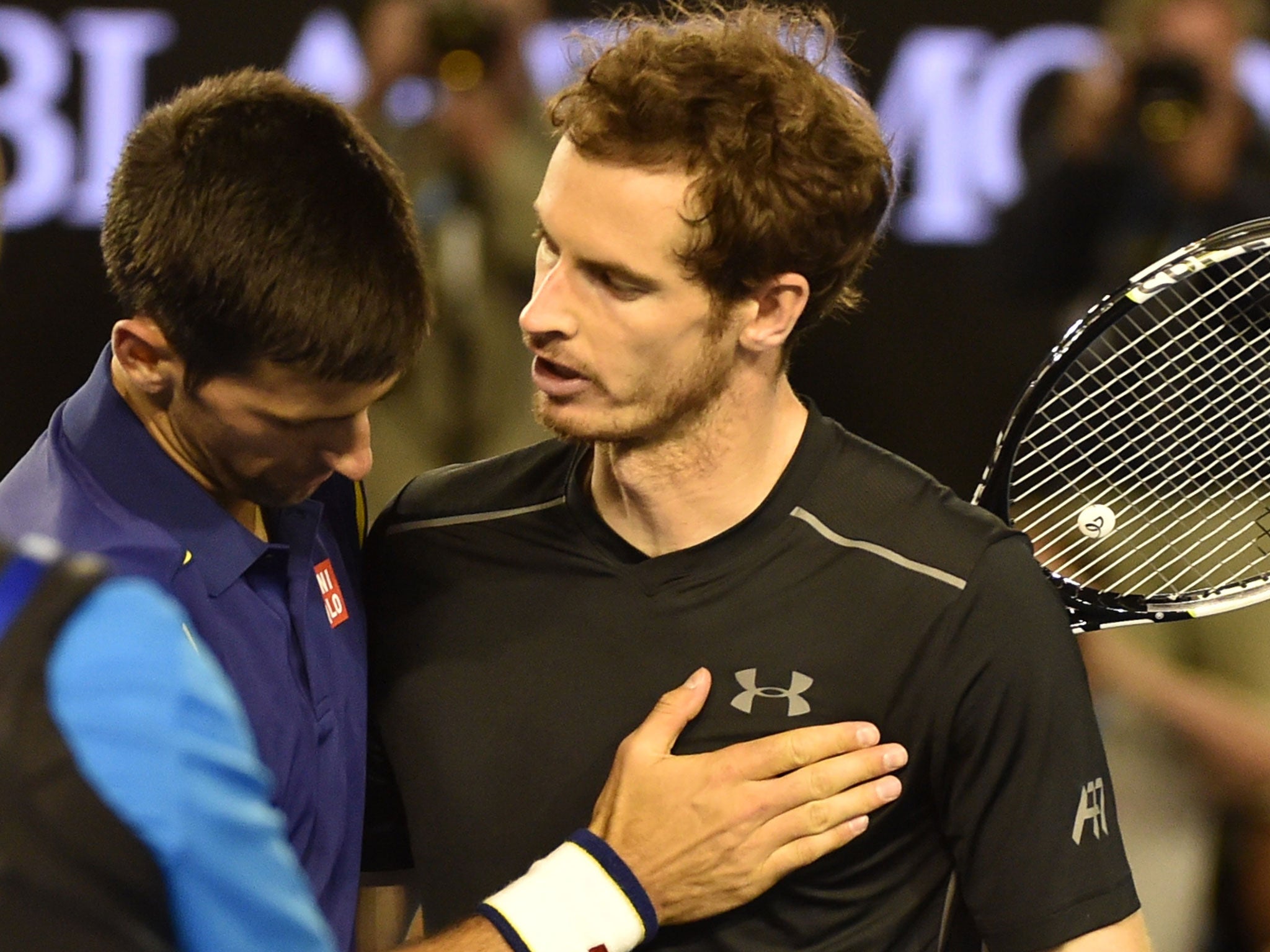 Andy Murray is consoled by Novak Djokovic after his Australian open final defeat