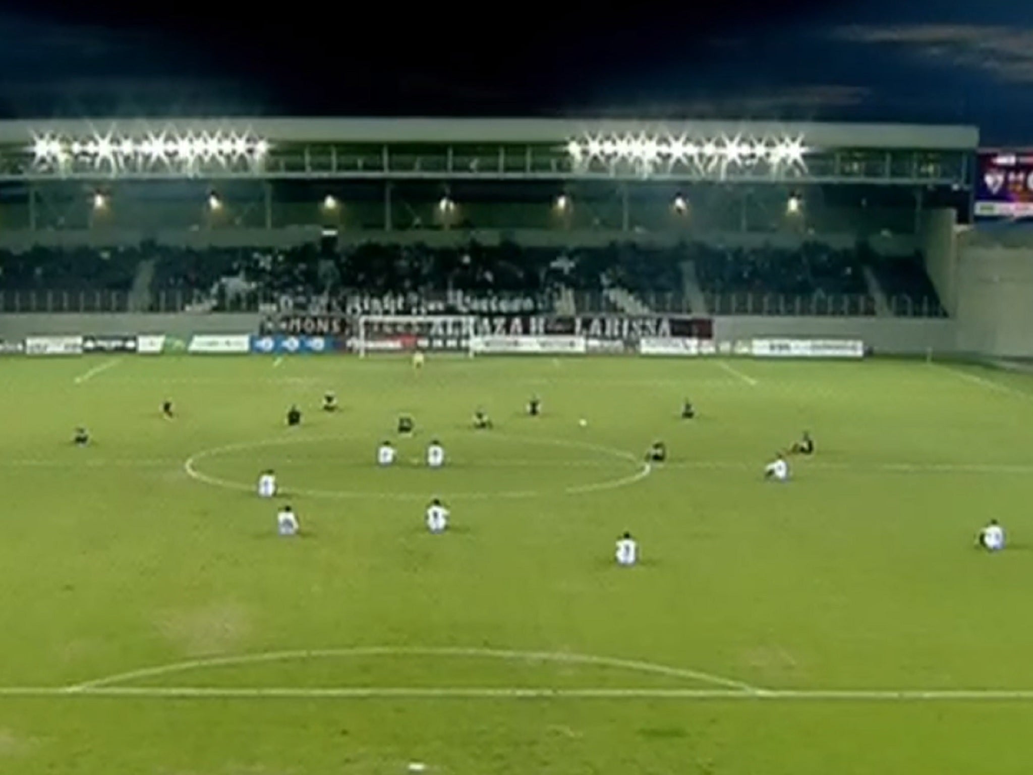 Supporters of second division Greek clubs AEL Larissa and Acharnaikos stage a sit-down protest against the “brutal indifference” of the European Union and Turkish government towards the migrants crisis.