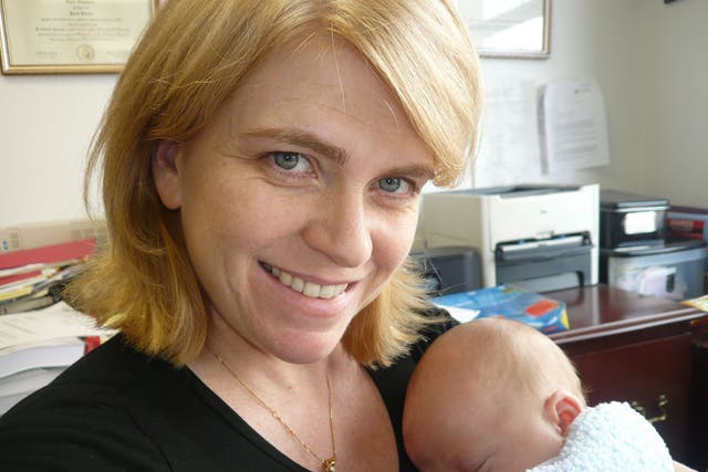 Clinging to life: Elise Schwarz in hospital with her son