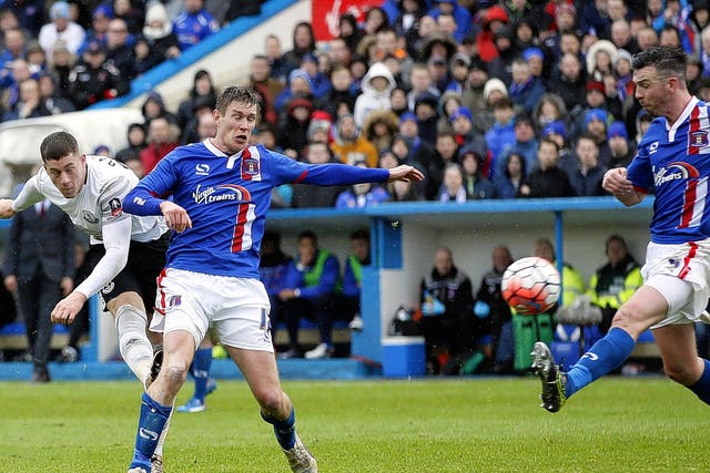 Ross Barkley (left) scores Everton’s third goal at Brunton Park