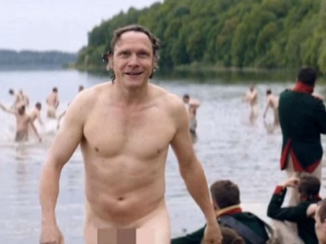 Surprise! A naked soldier emerges from a lake to speak to James Norton's character