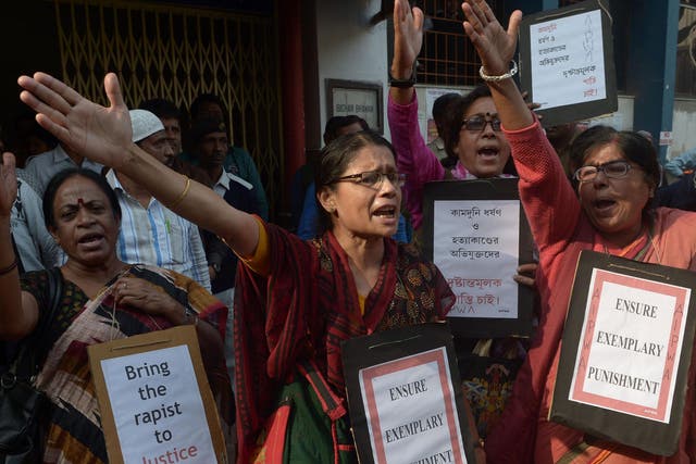 Social activists shout slogans against the judgment of the rape and murder case of Kamduni