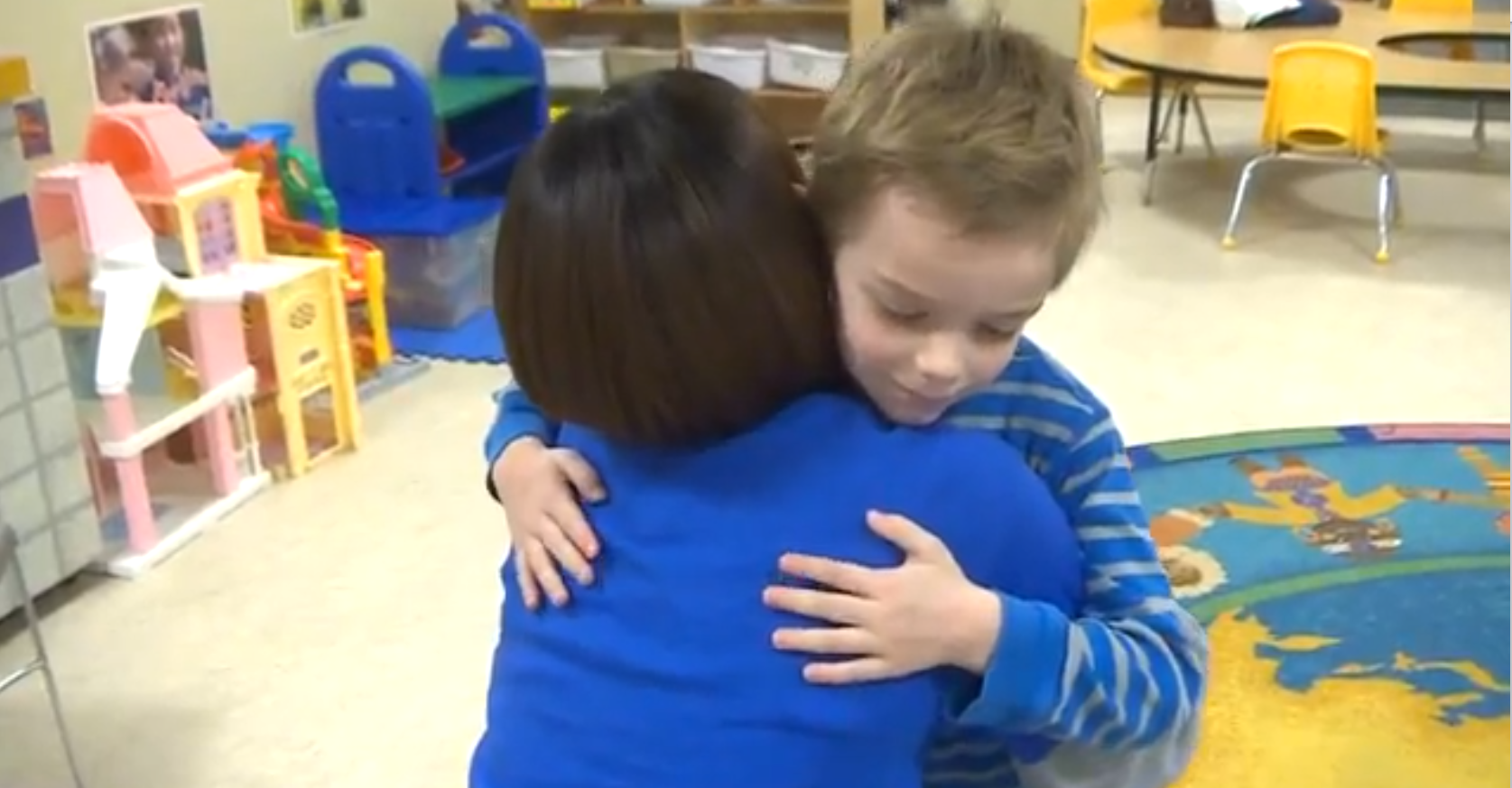 Camden hugs his teacher, who is suffering from lung cancer