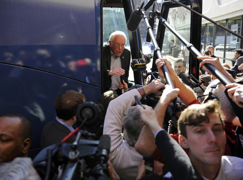 Reporters greet Bernie Sanders