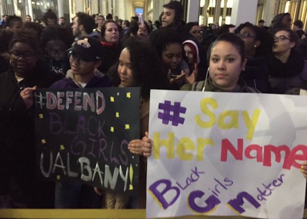 Protesters rally after three black students were beaten and called racial slurs near the University of Albany.