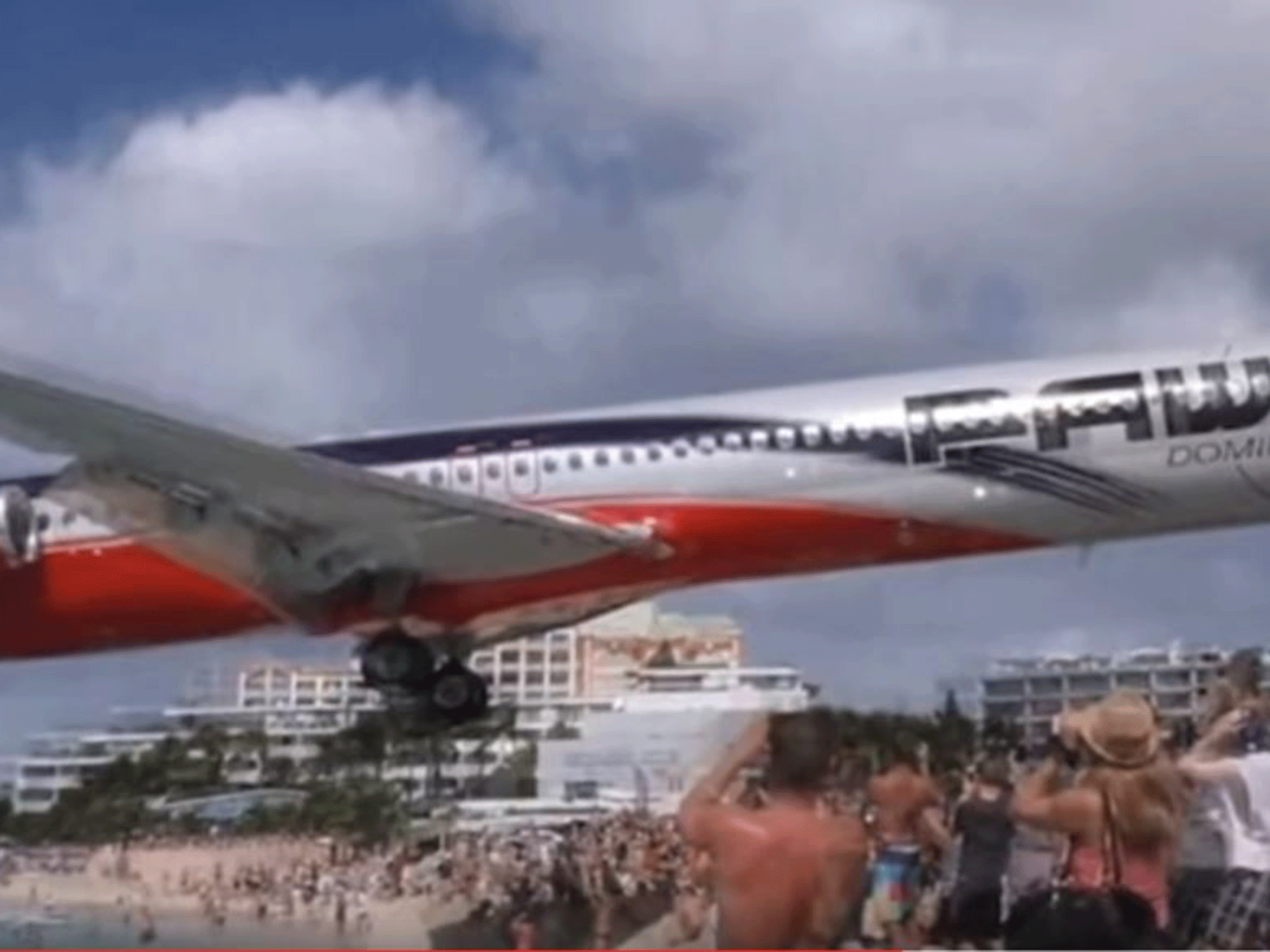 Plane Flies Yards Above Tourists Heads In Video Shot At