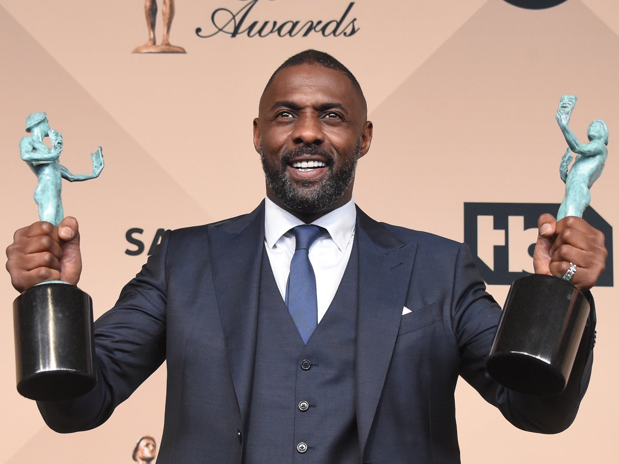 Actor Idris Elba poses in the press room after winning Outstanding Performance by a Male Actor in a Supporting Role award for 'Beasts of No Nation' during the 22nd Annual Screen Actors Guild Awards at The Shrine Auditorium in Los Angeles