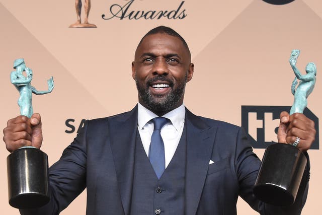 Actor Idris Elba poses in the press room after winning Outstanding Performance by a Male Actor in a Supporting Role award for 'Beasts of No Nation' during the 22nd Annual Screen Actors Guild Awards at The Shrine Auditorium in Los Angeles