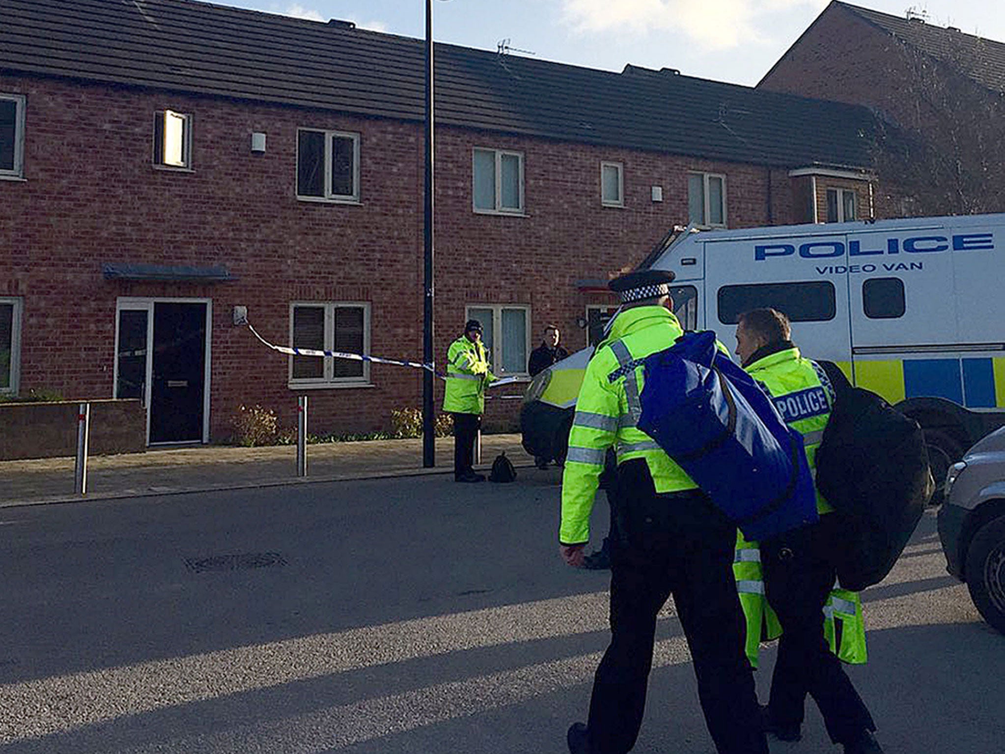 Police at the scene in Beeston Way, Allerton Bywater near Leeds PA