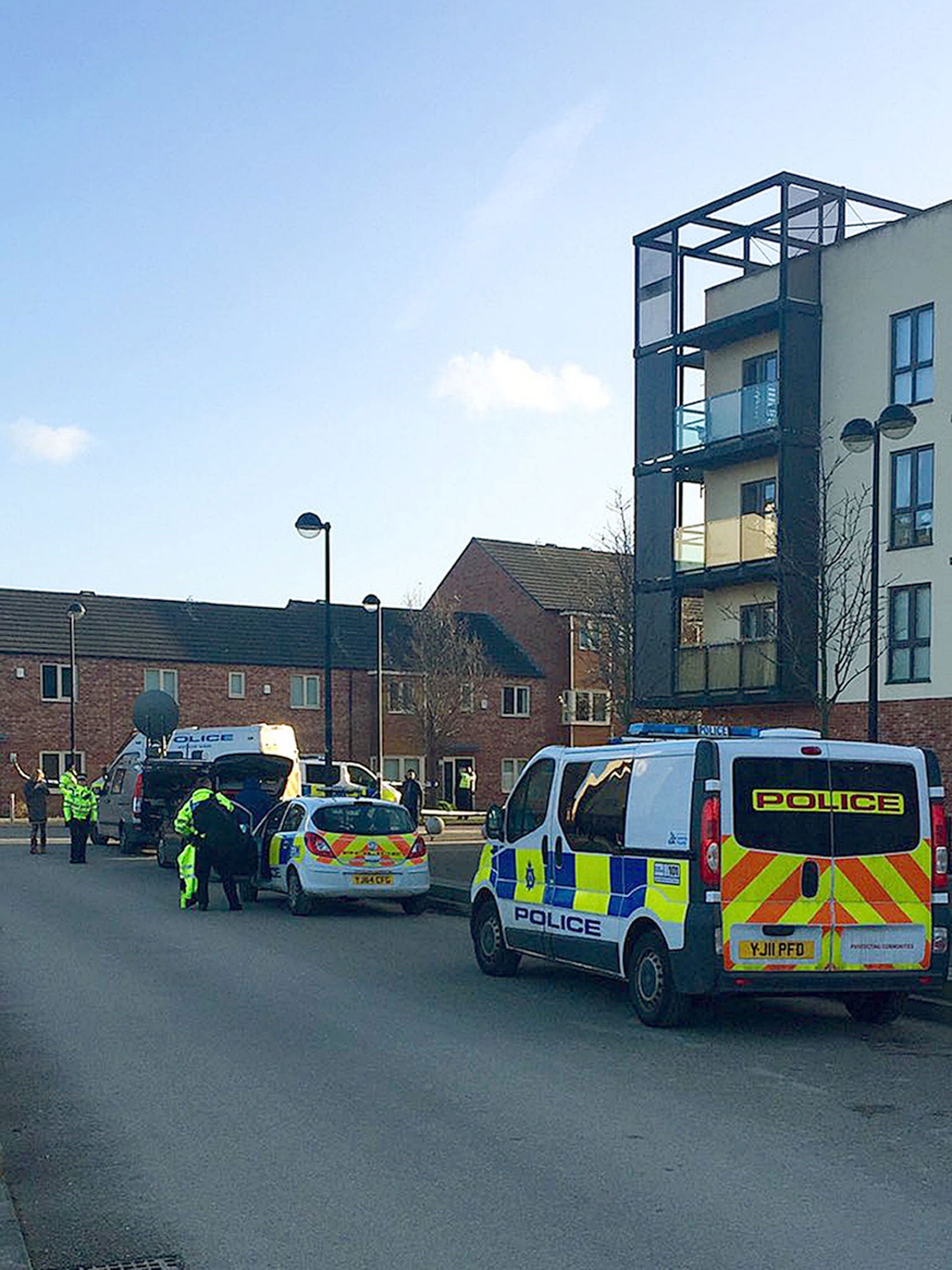 Police at the scene in Beeston Way, Allerton Bywater near Leeds PA