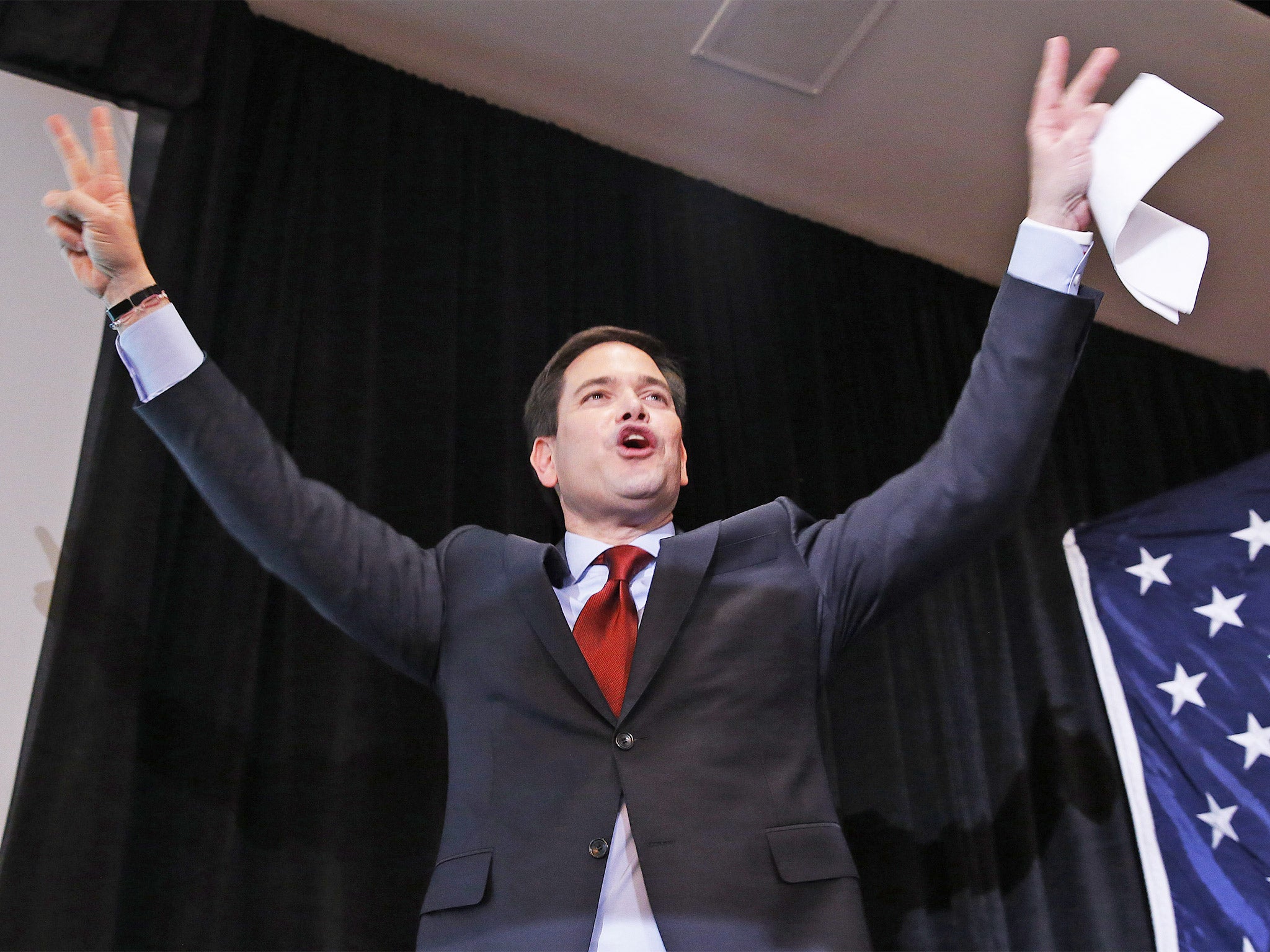 Republican presidential candidate Marco Rubio acknowledges the audience at a caucus night celebration in Des Moines, Iowa