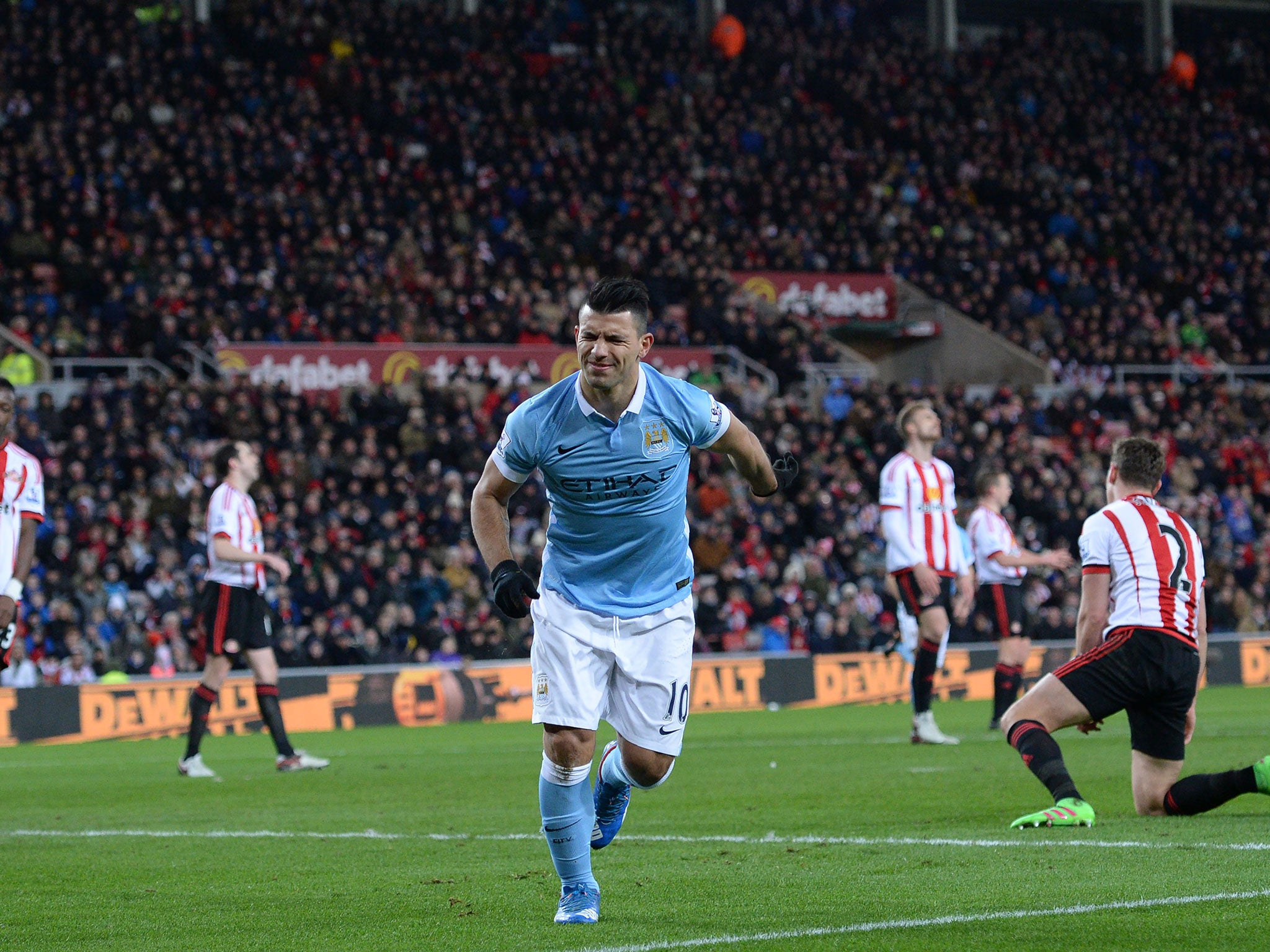 Sergio Aguero winces after opening the scoring