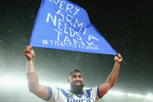 Frank Pritchard holds up a sign to the crowd after his final match for the Canterbury Bulldogs last September
