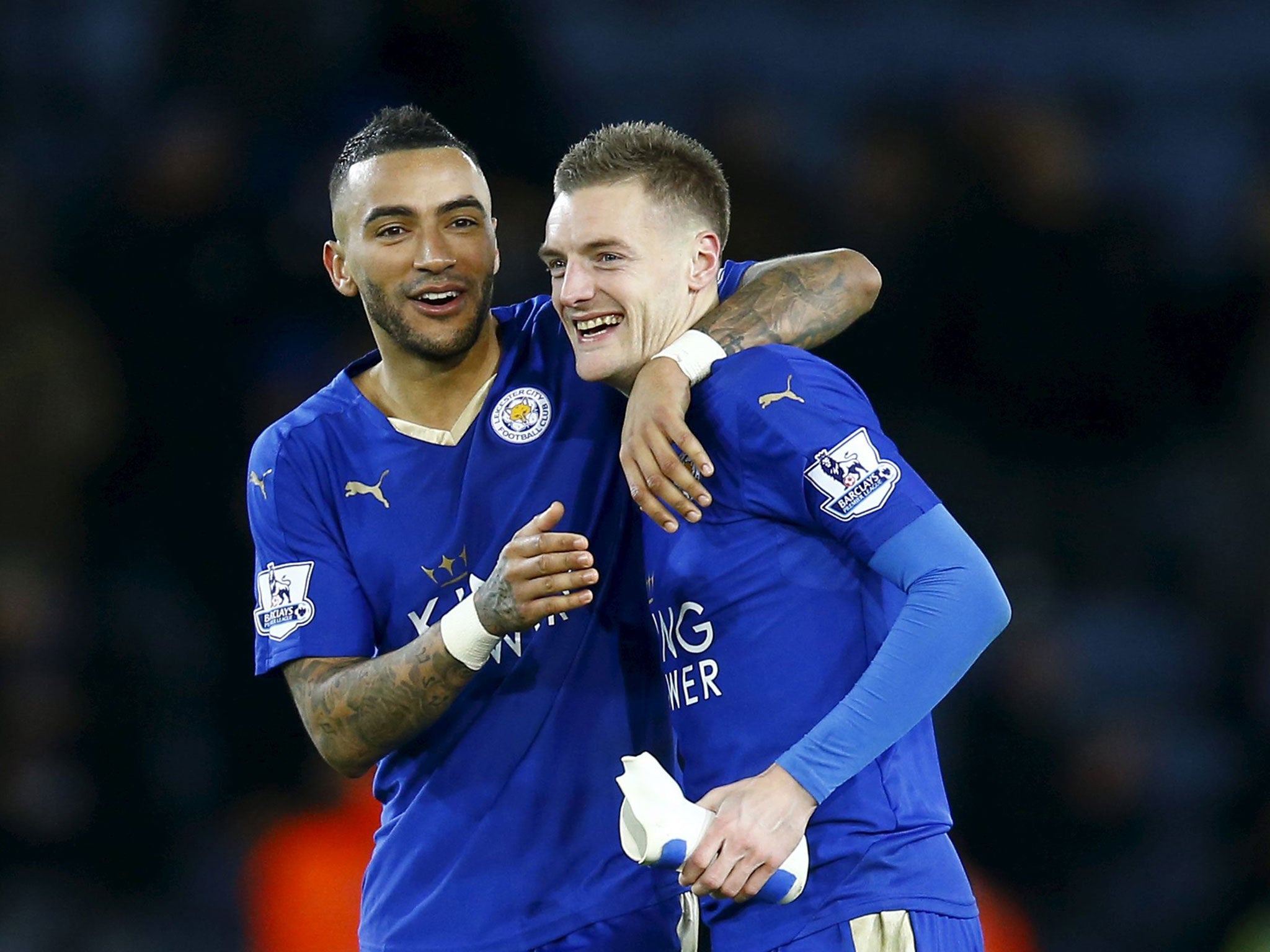 Jamie Vardy celebrates with Danny Simpson after scoring Leicester's first goal against Liverpool