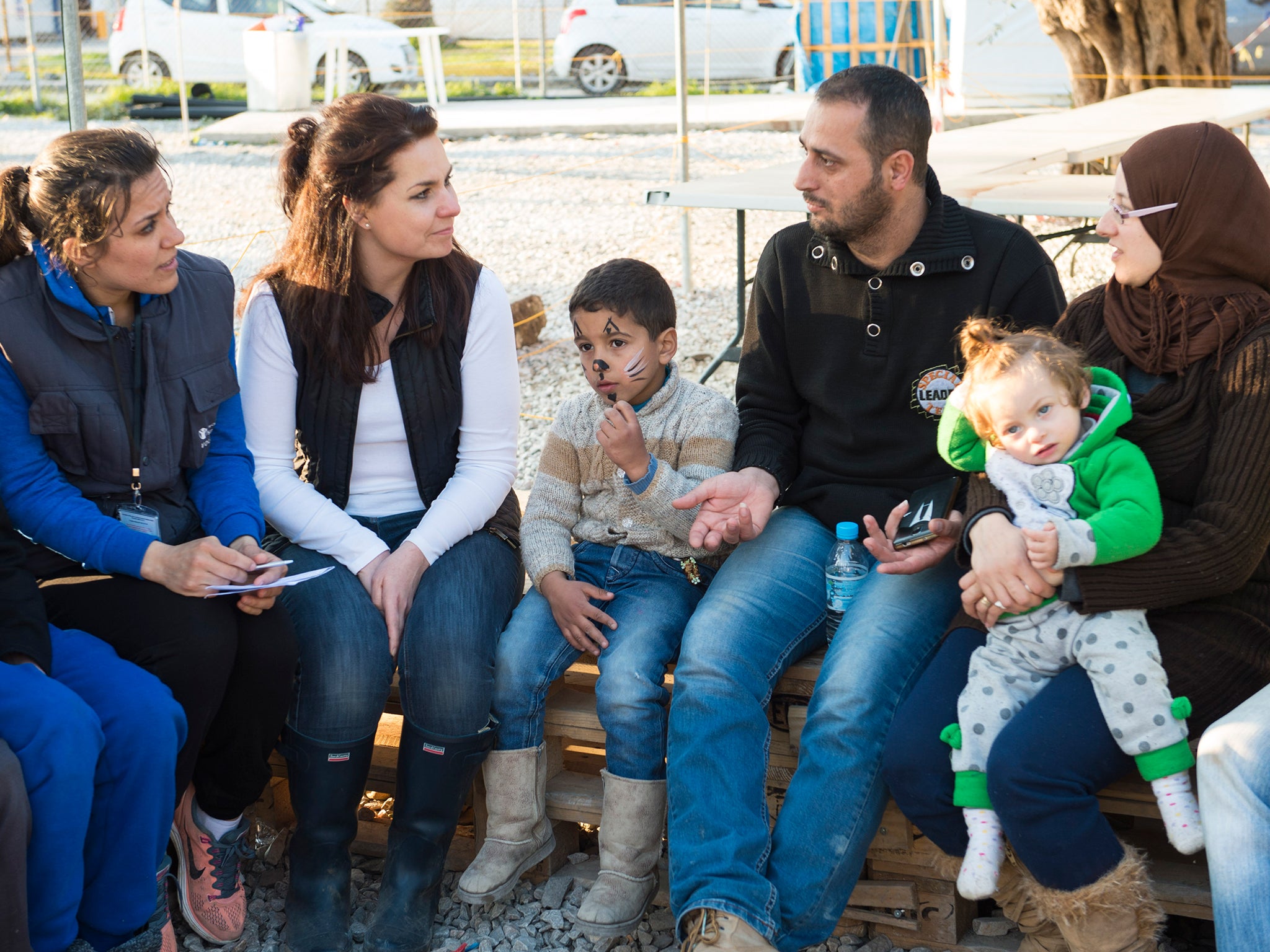 Ms Allen meets a family from Syria inside the Kara Tepe refugee camp (Matt Crossick/Save The Children)