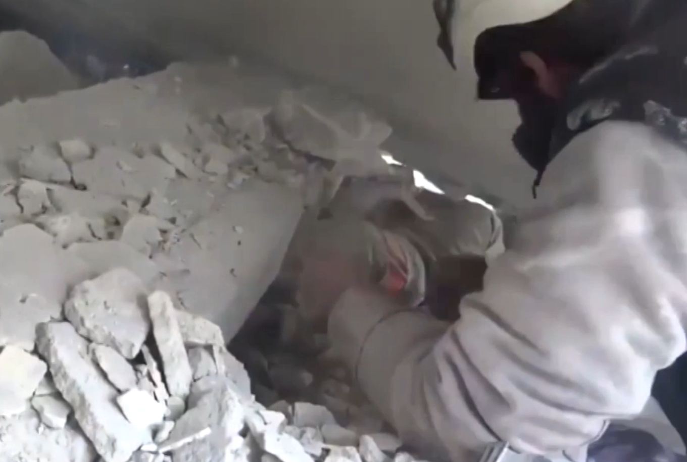 syrian-toddler-rubble-haritan-syria.PNG