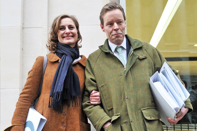 George Bingham, the 8th Earl of Lucan, and his wife Anne-Sofie Foghsgaard outside the High Court