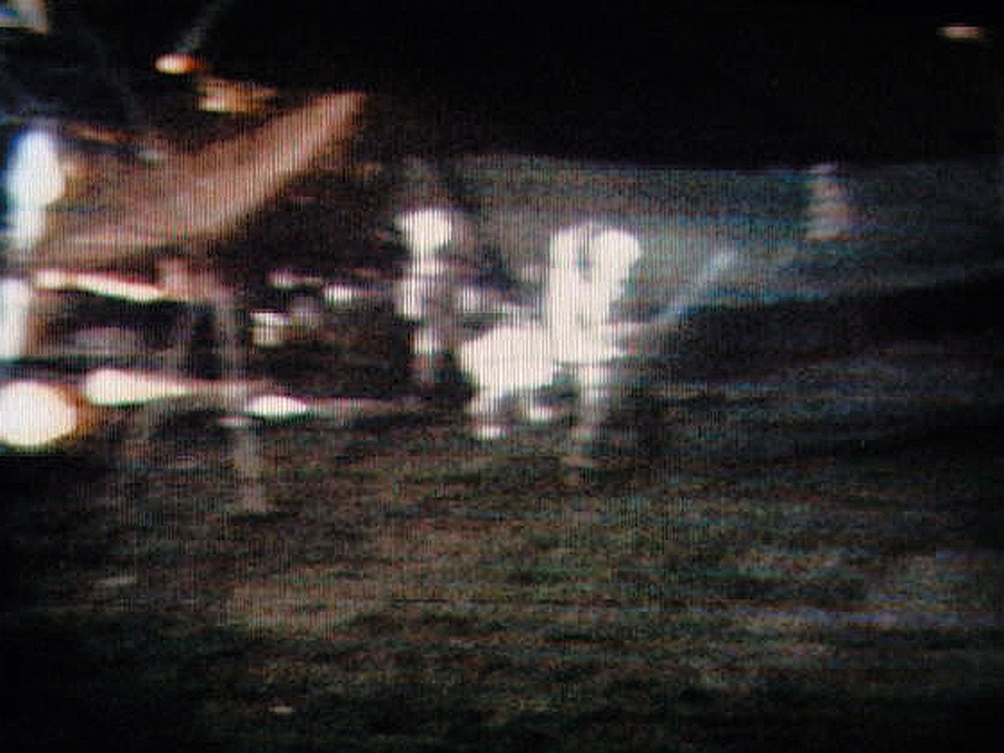 Apollo 14 commander Alan Shepard is seen playing golf on the moon in 1971