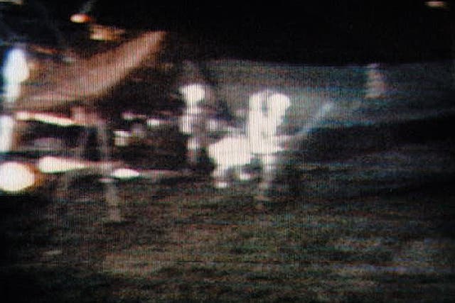 Apollo 14 commander Alan Shepard is seen playing golf on the moon in 1971