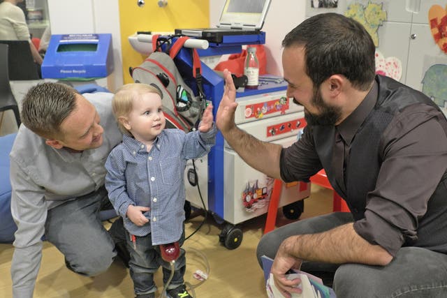 Evgeny Lebedev meets Elliott Livingstone in a Great Ormond Street Hospital playroom as part of the GOSH campaign