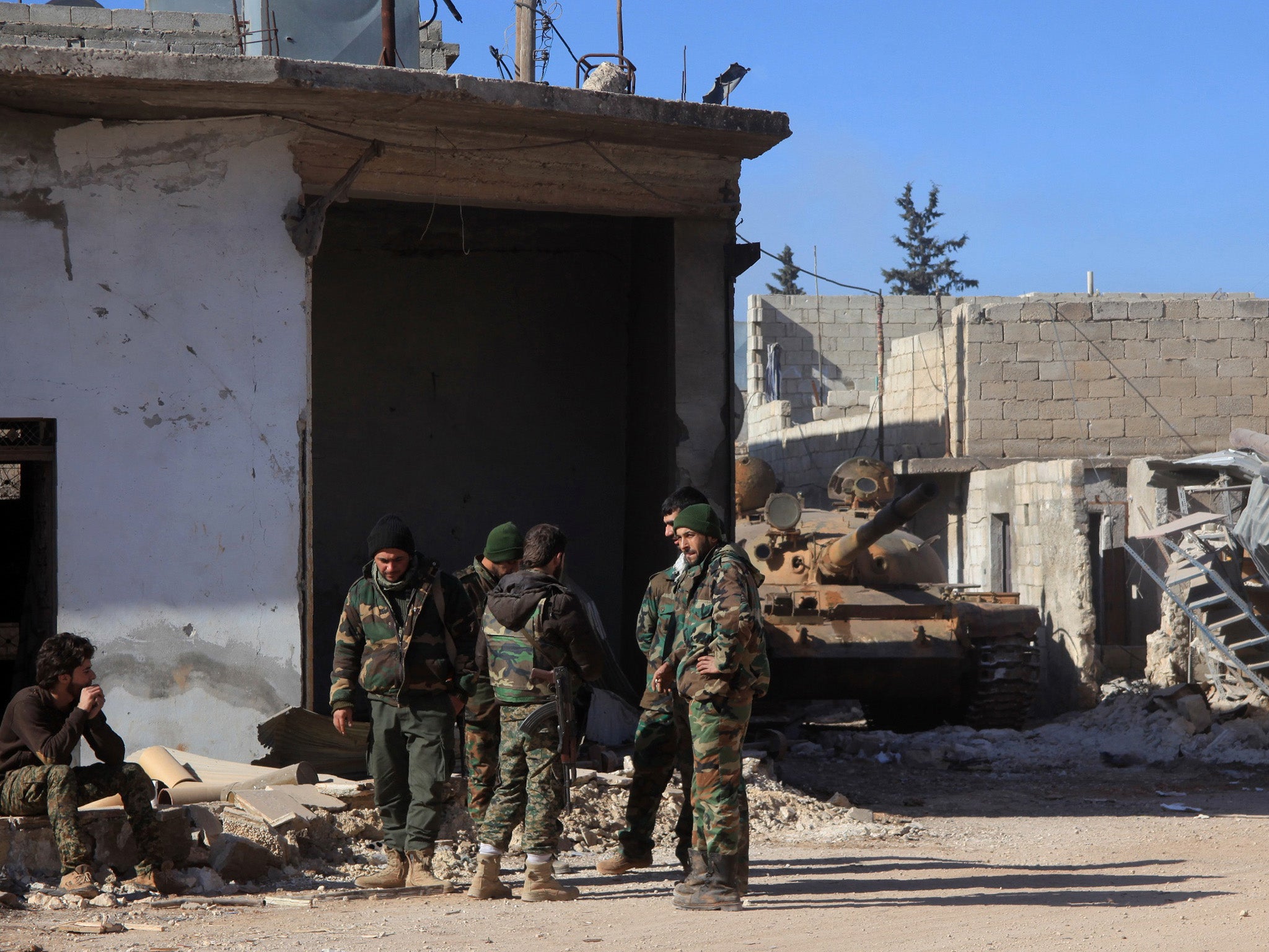 Pro-government soldiers in the town of Tal Jabin, north of Aleppo, ahead of the assault to recapture Nubul and Zahraa