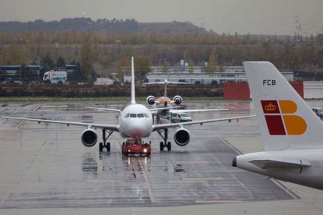 A flight (not pictured) was grounded at Madrid's Barajas airport today after a bomb threat was discovered