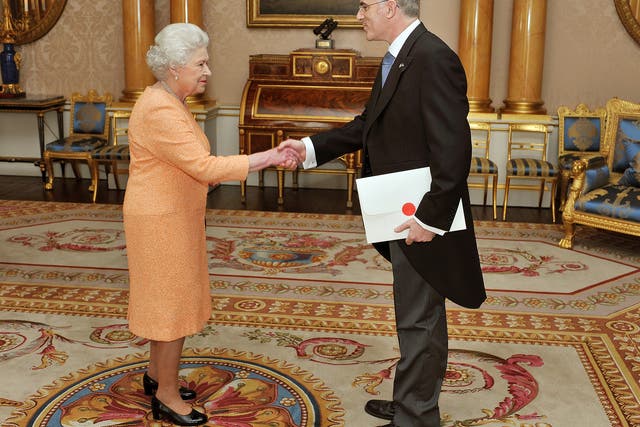Queen Elizabeth II shakes hands with the ambassador of Israel Daniel Taub in 2011