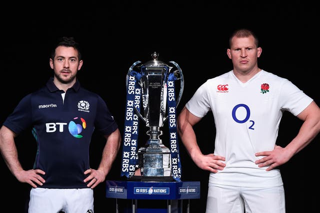 Greig Laidlaw of Scotland and Dylan Hartley of England alongside the Six Nations trophy