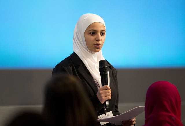 Muzoon Almellehan speaks during the 'Supporting Syria and the Region' conference at the Queen Elizabeth II Conference Centre in London, Thursday, Feb. 4, 2016.