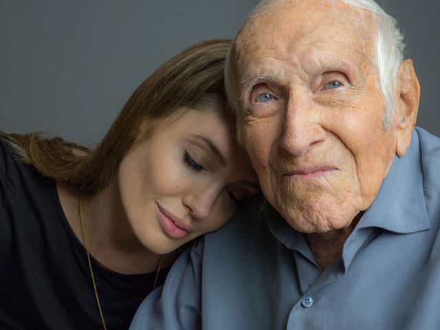 Angelina Jolie with Louis Zamperini, who survived the war