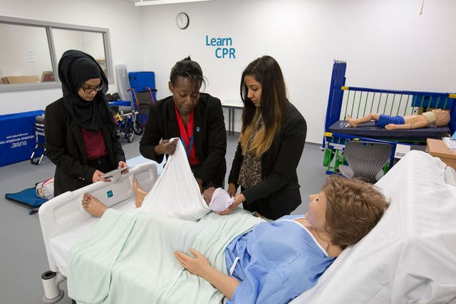 Students learn how to deal with patients on a mock-up of a hospital ward (called a simulation ward) at the Health Futures University Training College in West Bromwich