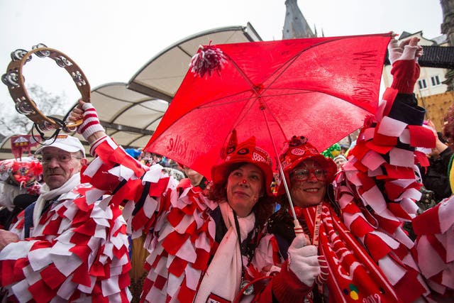 People wearing costumes celebrate carnival in Cologne, Germany. The carnival peak season has begun with increased security measures in place following a string of New Year's Eve attacks when scores of women reported to have been sexually harassed and robbed at the city's main train station