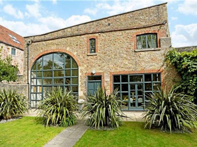 Hop House is a four bedroom home in Holcombe, near Bath. Features include stone walls and reception rooms with vast windows. This former brewery was owned by the parents of explorer Robert Scott. On for £895,000 with Fine & Country.