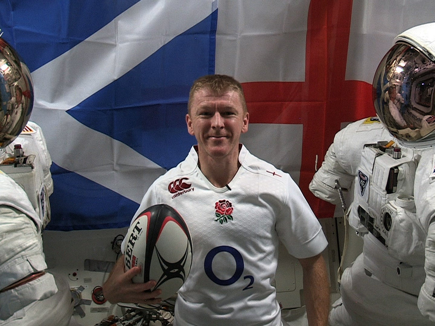 Tim Peake poses in his England shirt ahead of the Six Nations opener against Scotland