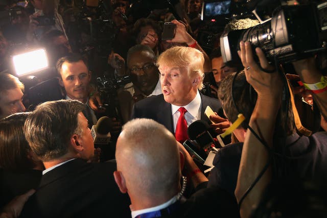 Trump talks to reporters after apresidential debate in Cleveland, Ohio