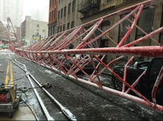 New York crane collapse leaves one dead and three injured