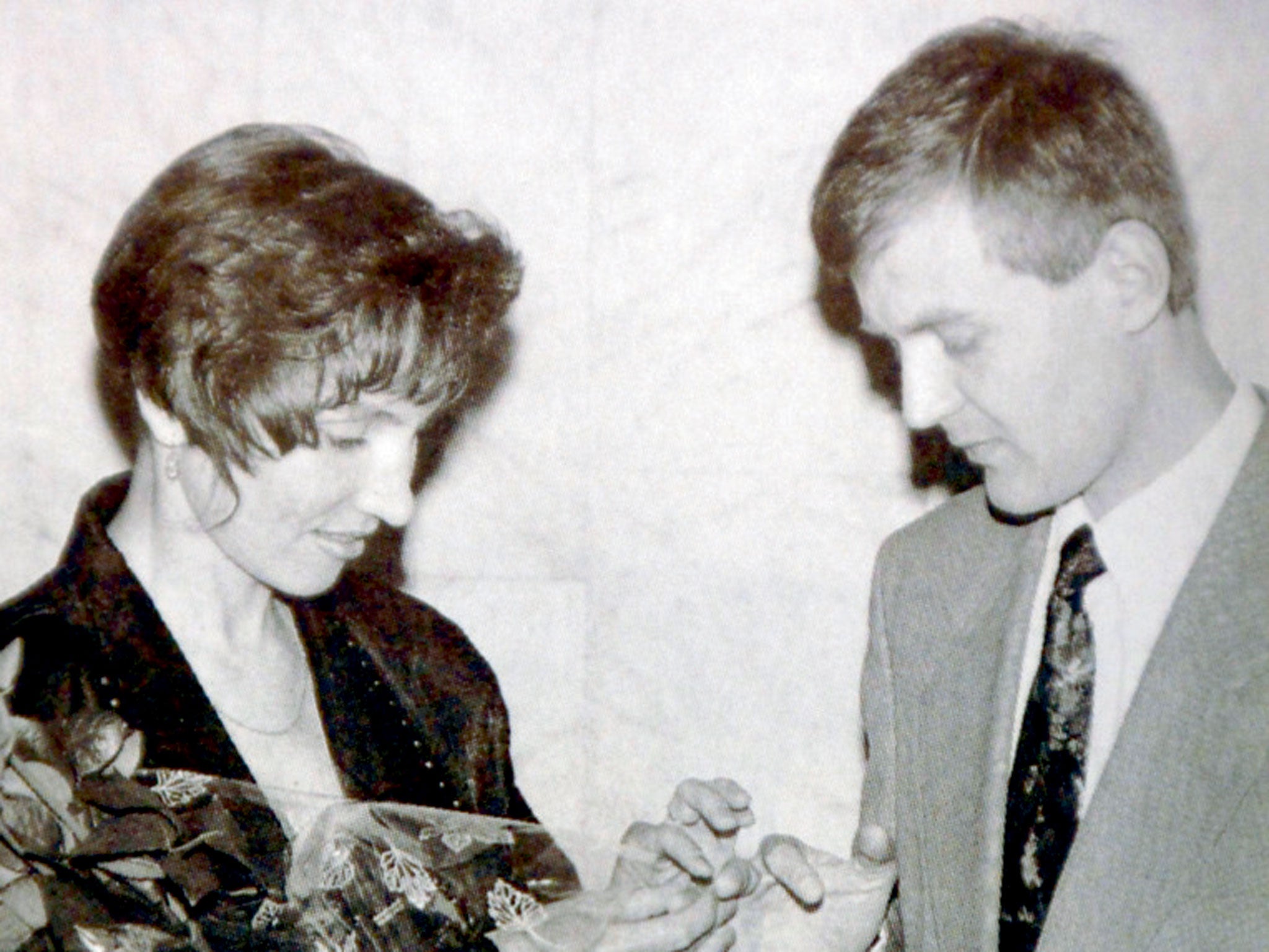 Litvinenko with his wife Marina on their wedding day in 1994 - both said it was love at first sight (Getty)