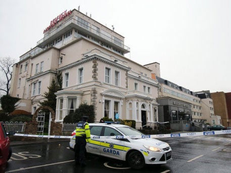 A Garda cordon outside the Regency Hotel in Dublin after one man died and two others were injured following a shooting incident at the hotel.