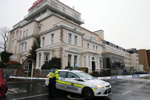 A Garda cordon outside the Regency Hotel in Dublin after one man died and two others were injured following a shooting incident at the hotel.