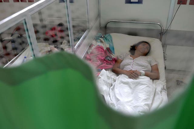 A patient suffering from Guillain-Barré, in which the immune system attacks the nerves, in El Salvador last month
