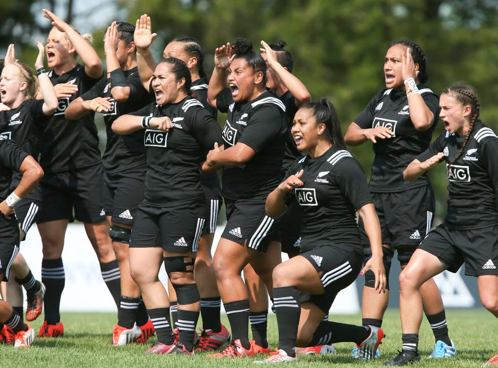 The New Zealand women's rugby team does the traditional war dance before playing England during the Women's Rugby Super Series at Red Deer Rugby Club